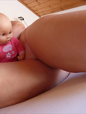 German Plentiful Butt Girl Fully butt-naked and playing around with a foxy Baby Doll!